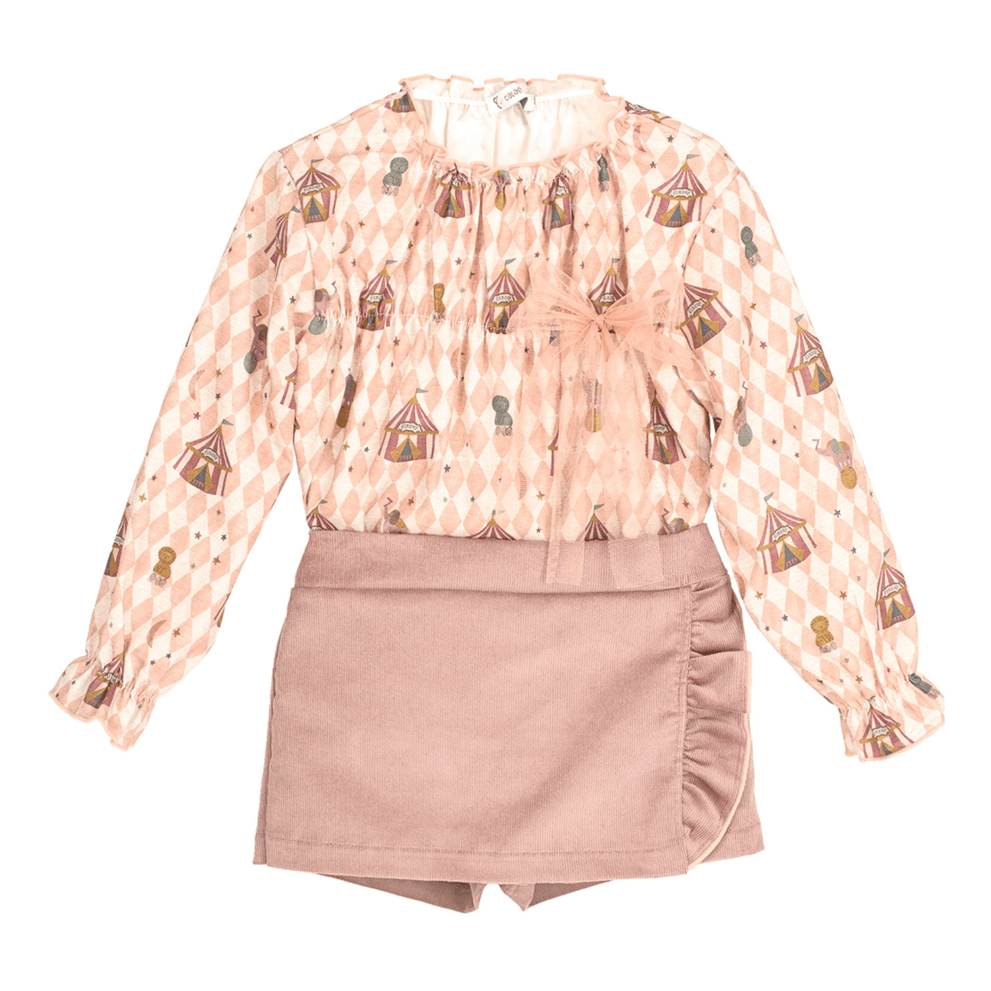 Completo calamaro circus Blusa in caldo cotone fantasia con fiocco in tulle.
Short effetto gonna in velluto mille righe.